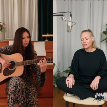 A split-screen musical collaboration with Xiao on acoustic guitar and a vocalist